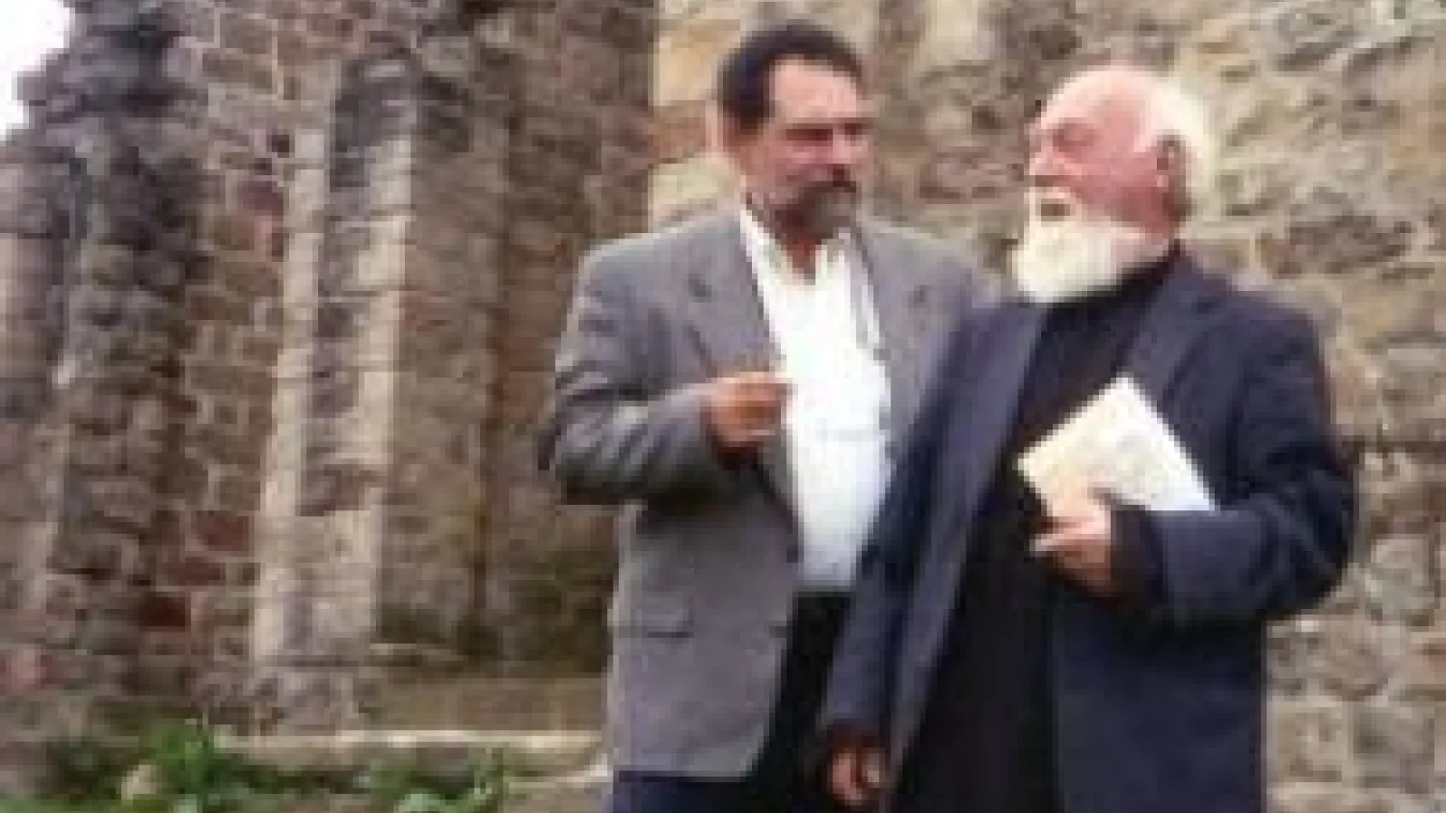 photo of Predragj Matejic in front of church ruins