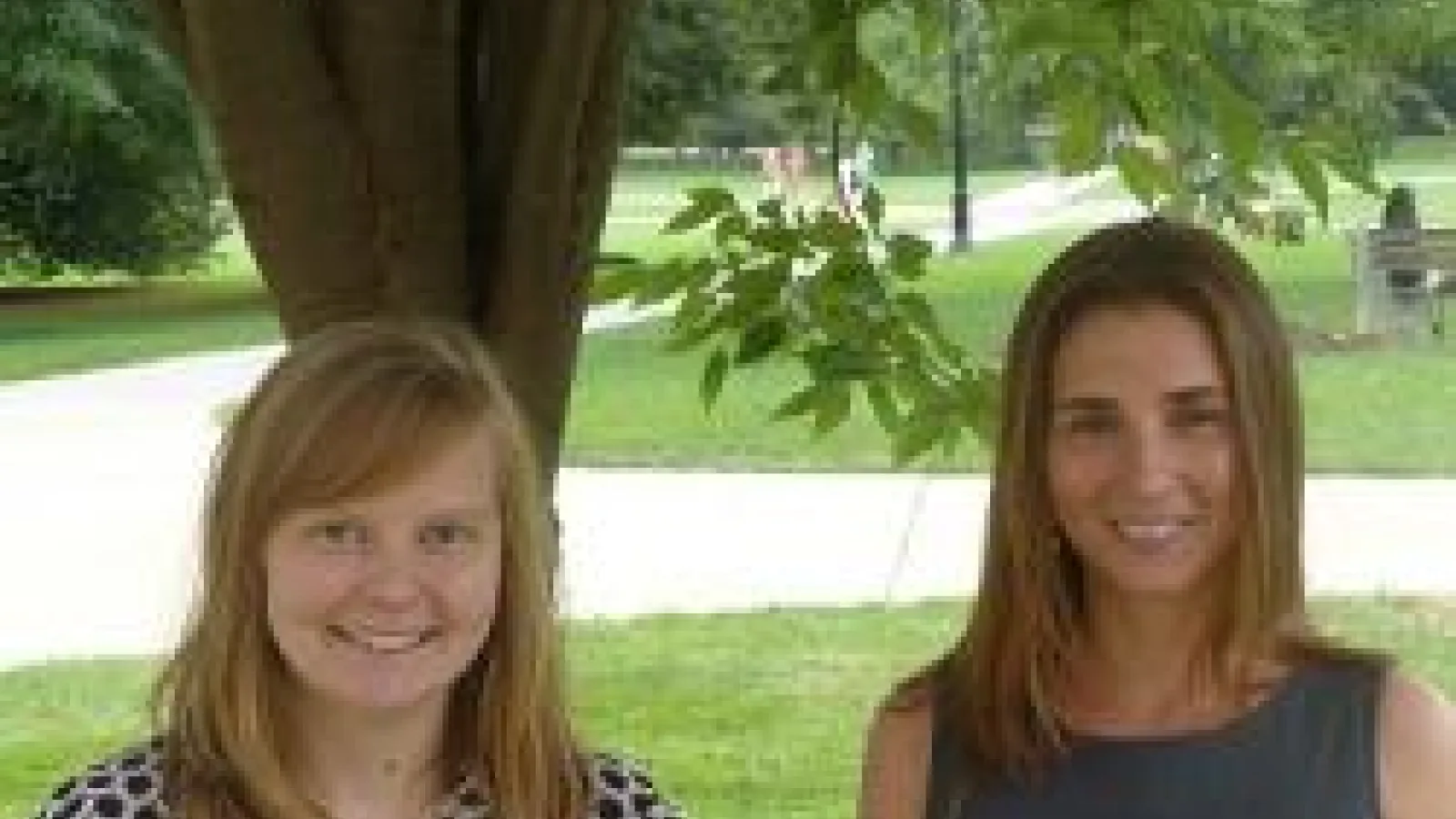 photo of Marina and Anna in front of a tree