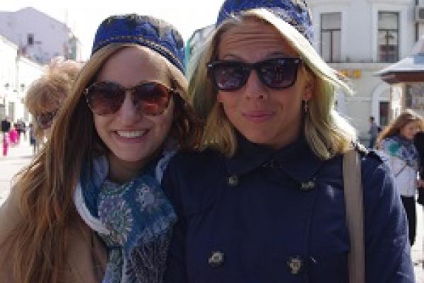 Robin Smith, on left, with her Russian host sister wearing traditional Tatar hats called tubeteikas