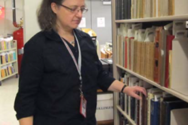 photo of Pasha Johnson in the library