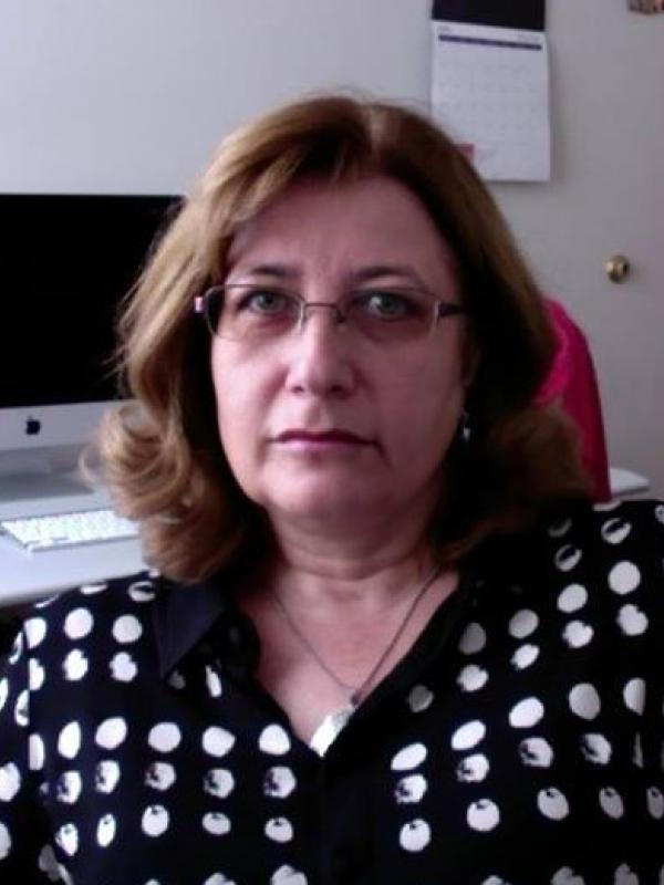Dr. Mila Shevchenko